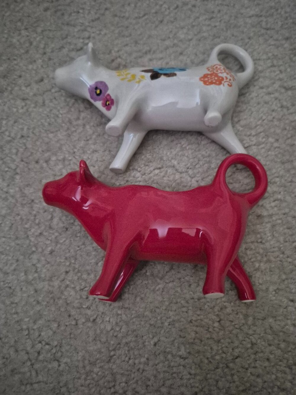 2 poineer women  cream cows